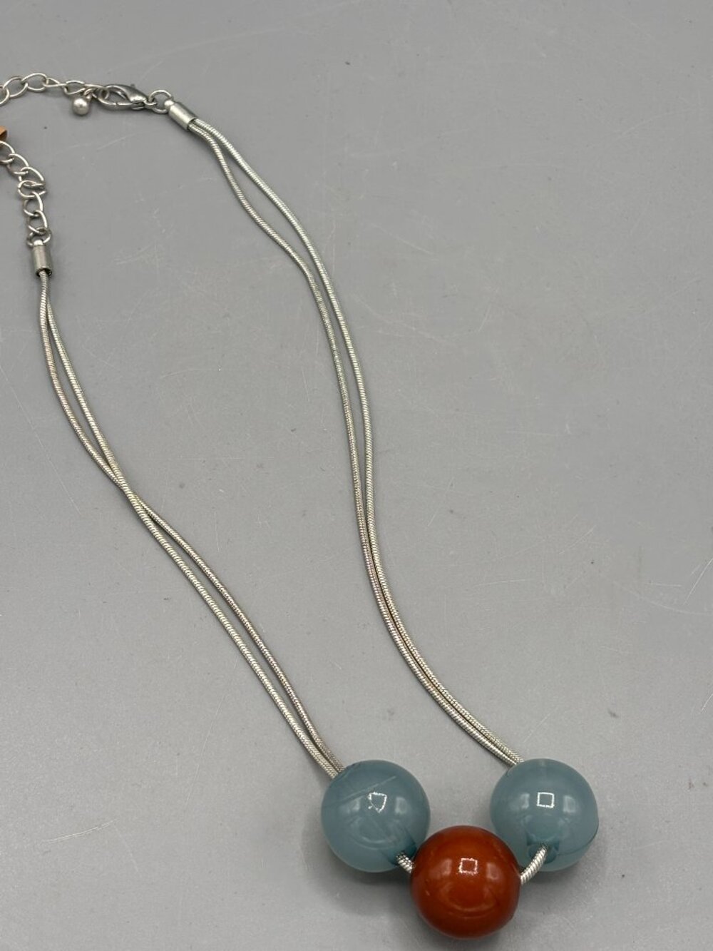 Silver tone blue & brown necklace